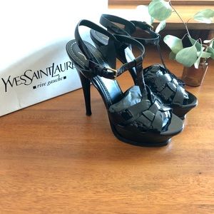 SAINT LAURENT
Tribute 105 patent-leather sandals